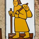 A medieval pilgrim visiting Monterrigioni just like us today.