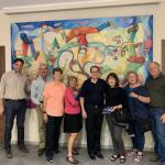 The beautiful mural at the winery and our guide Alessandro.