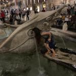 Cheryl is not afraid to try that fresh spring water in Rome.