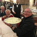 Richard has a really big Tiramisu for dessert.