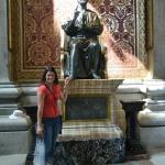 Emily rubbing the feet of the ancient statue of St. Peter.
