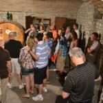 Taking a tour through the ancient ageing cellars.