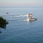 Watching a helicopter chasing boats on the sea.