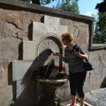 Sue goes for a cool drink of water at Il Nasone.