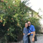 Christie and Bill with a Pomegrante tree at Fattoria San Donato.