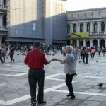 John and Charlotte dancing in St. Mark's Square.  Whoop!