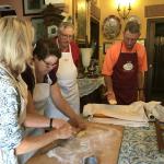 Learning to make one of the local breads called tigelle or crescentina.