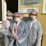 The ladies are ready to tour the Parmesan making facility.  Can you guess who they are?
