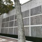 Wall of the missing with over 1000 names.