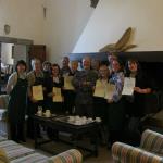 The group get their diplomas from Chef Andrea.