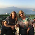 JyNohn and Lorraine with Mount Vesuvius in the background.