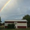 Beautiful rainbow over the old original ranch house.