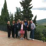 A great group with a great background of the Chianti hills